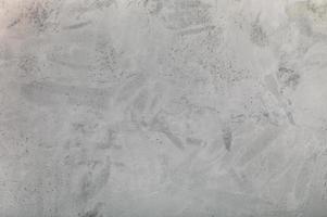 achtergrond van de grijs beton getextureerde muur foto