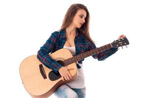 mooi jong vrouw met gitaar foto