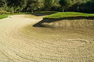 abstract van golf Cursus en zand bunker. foto