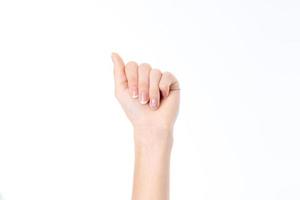 vrouw hand- tonen de gebaar met krom naar beneden uw vingers is geïsoleerd Aan een wit achtergrond foto