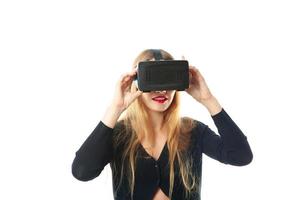 vrouw in virtueel realiteit helm foto