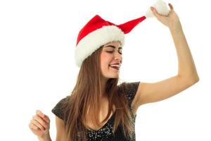 portret van gelukkig vrouw in de kerstman hoed foto