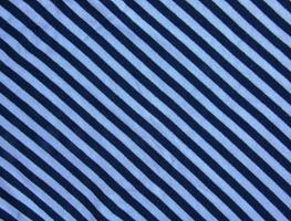 marinier textiel structuur voor achtergrond. detailopname van een marinier textiel structuur met blauw en wit diagonaal strepen. foto