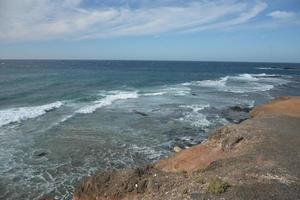 vulkanisch geologisch gecorrodeerd lagen, Faro de punta Jandia, fuerteventura, kanarie eilanden, Spanje. foto