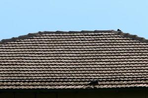 betegeld dak Aan een woon- gebouw in Israël. foto