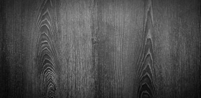 grijs houten achtergrond in zwart en wit toon of monochroom afbeelding. grijs hout paneel muur of behang. foto