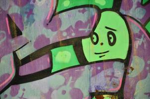 de oud muur, geschilderd in kleur graffiti tekening groen aërosol verven. achtergrond beeld Aan de thema van tekening graffiti en straat kunst foto