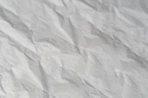 gerimpeld of verfrommeld wit stencil papier of zakdoek na gebruik in toilet of toilet met groot kopiëren ruimte gebruikt voor achtergrond structuur in kunst werk foto