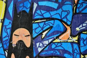 gedetailleerd beeld van kleur graffiti tekening. achtergrond straat kunst achtergrond met een geschilderd karakter foto
