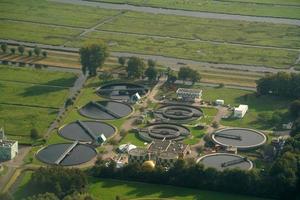 ontzilting fabriek Amsterdam antenne panorama landschap terwijl landen foto