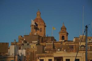 Malta de drie steden Bij zonsondergang - vittoriosa, senglea en cospicua foto