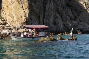 cabo san lucas, Mexico - februari 1 2019 - toerist in water activiteiten foto