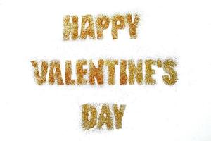 gelukkig Valentijnsdag dag belettering in pailletten Aan wit achtergrond foto