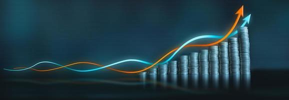 twee economisch groei lijnen rennen omhoog een serie van munt kolommen tegen een donker blauw achtergrond foto
