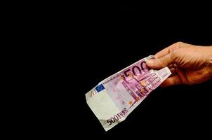 hand- met contant geld foto