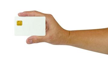 hand met lege witte creditcard geïsoleerd op een witte achtergrond, plastic debetkaart, inclusief uitknippad foto
