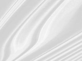 wit mode textiel glad abstract schoonheid schoon en zacht kleding stof getextureerd. vrij stijl vorm versieren achtergrond foto