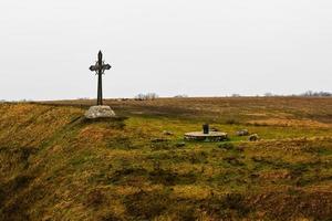 oude kruis in kamyanets-podilskyi foto