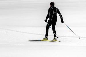 kruis land skiën in Alpen foto