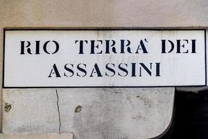 Venetië Rio terra dei huurmoordenaar, Engels vertaling moordenaar straat teken foto