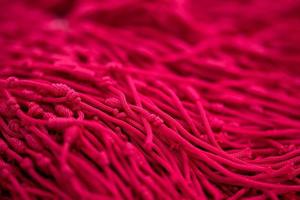 rood roze touw achtergrond in conceptuele abstract voor achtergrond. foto