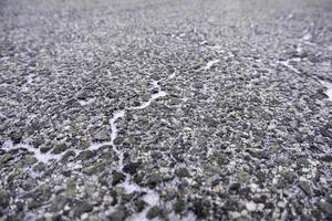 asfalt met ijs foto