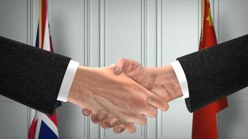 Verenigde koninkrijk uk en China ambtenaren bedrijf ontmoeting. diplomatie overeenkomst. partners handdruk foto