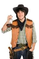 gelukkig jong cowboy met een fles foto