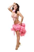 jong brunette in roze dansen jurk. geïsoleerd foto