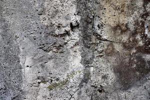 dichtbij omhoog visie Bij een graniet en steen muur structuur in een hoog oplossing. foto