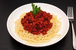 spaghetti bolognese pasta met tomaat saus en vlees foto