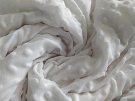 macro schot van een zacht wit deken. foto