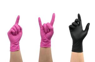 vrouw hand- in roze en zwart latex handschoen geïsoleerd Aan wit achtergrond foto