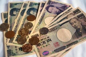 Japans yen aantekeningen en Japans yen munten voor geld concept achtergrond. foto