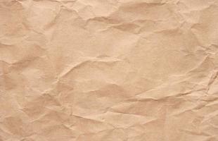 structuur van bruin verfrommeld ambacht papier, vol kader foto