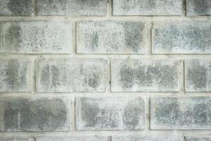 close-up van grijze bakstenen muur voor textuur of achtergrond foto