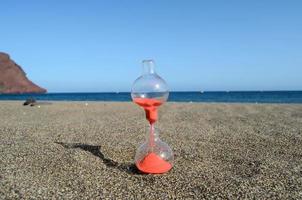 zandloper Bij de strand foto