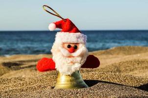 de kerstman Bij de strand foto