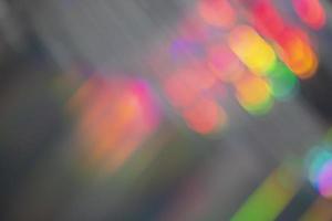 regenboog holografische bokeh achtergrond. veelkleurig overstroomt van kleur. foto