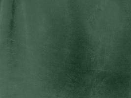 olijf- groen kleur fluweel kleding stof structuur gebruikt net zo achtergrond. licht olijf- groen kleding stof achtergrond van zacht en glad textiel materiaal. Daar is ruimte voor tekst. foto