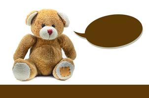 bruin teddy beer speelgoed- zittend Aan wit achtergrond foto
