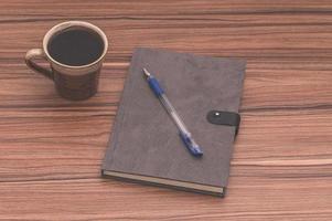 koffiemok en notitieboekje op tafel