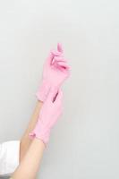 latex of rubber steriel handschoenen voor dokter, chirurg of verpleegster. ziekenhuis en laboratorium uitrusting voor bescherming tegen virus en infectie foto