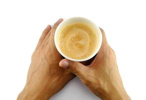 koffie mok met menselijk hand- foto