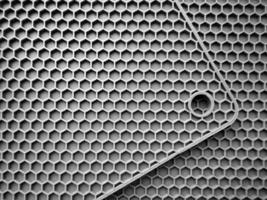 siliconen honingraat vorm geven aan. grijs structuur plastic mat. foto