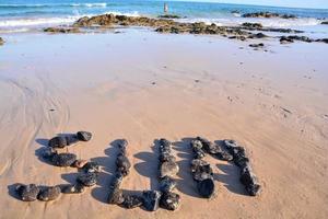 rotsen in de zand foto