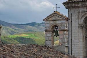 een klok van Italiaans kerk in umbrië foto