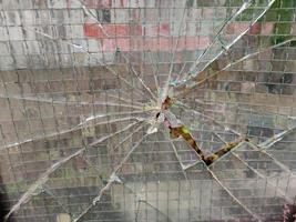 geweer kogel gebroken venster glas foto