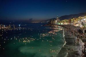 camogli, Italië - augustus 6 2017 - stella maris traditioneel kaarsen Aan de zee viering foto