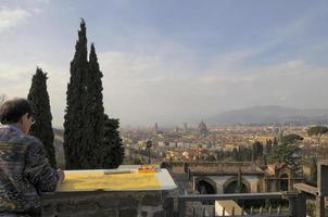 Florence antenne visie stadsgezicht met een schilder werken Aan project foto
